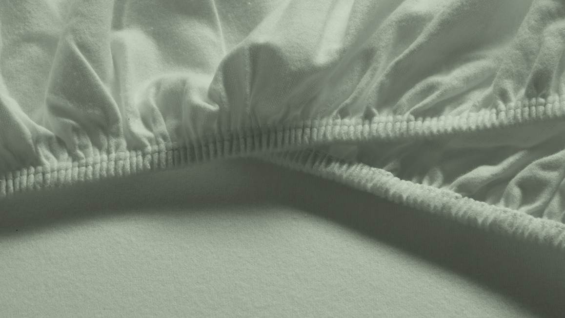 Snoozing flanel topper hoeslaken