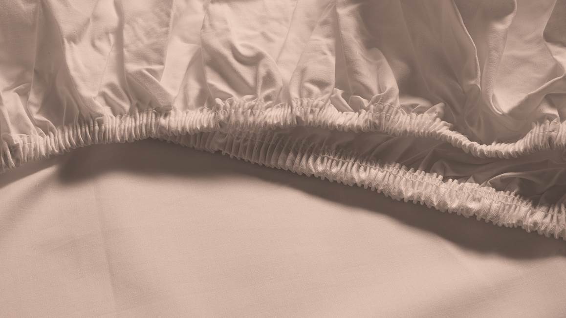 Snoozing percale katoen topper hoeslaken