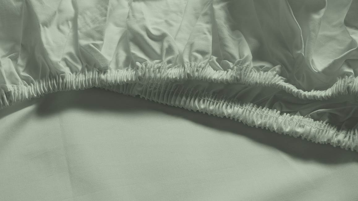 Snoozing percale katoen topper hoeslaken