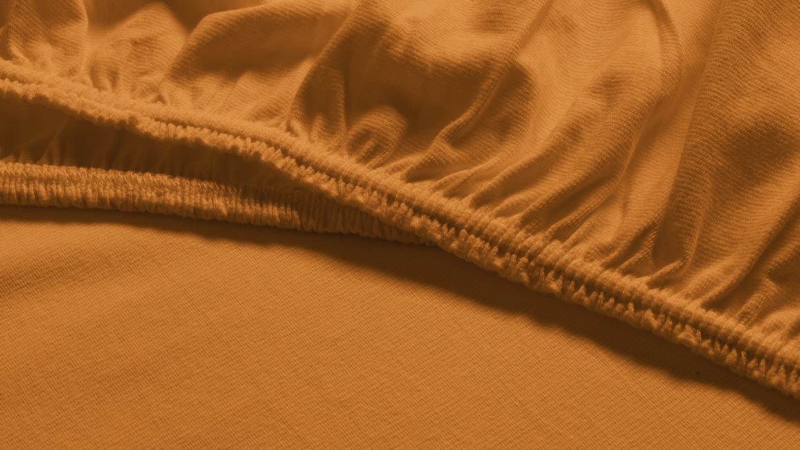 Snoozing jersey stretch topper hoeslaken