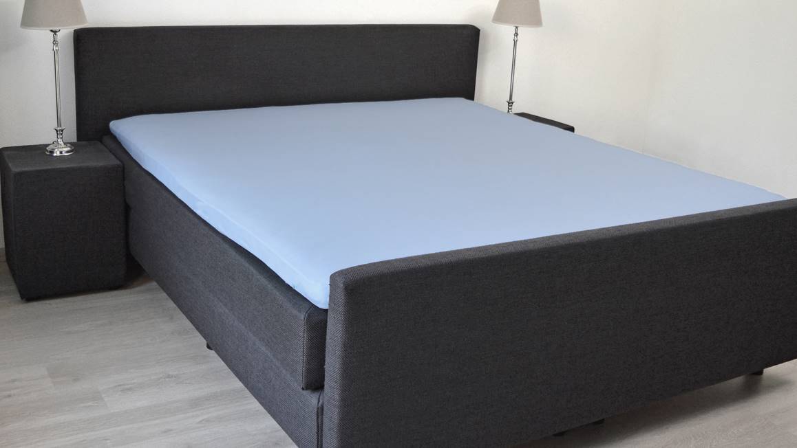 Snoozing jersey topper hoeslaken