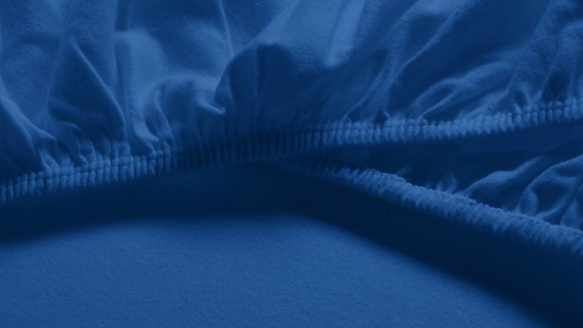 Snoozing flanel topper hoeslaken