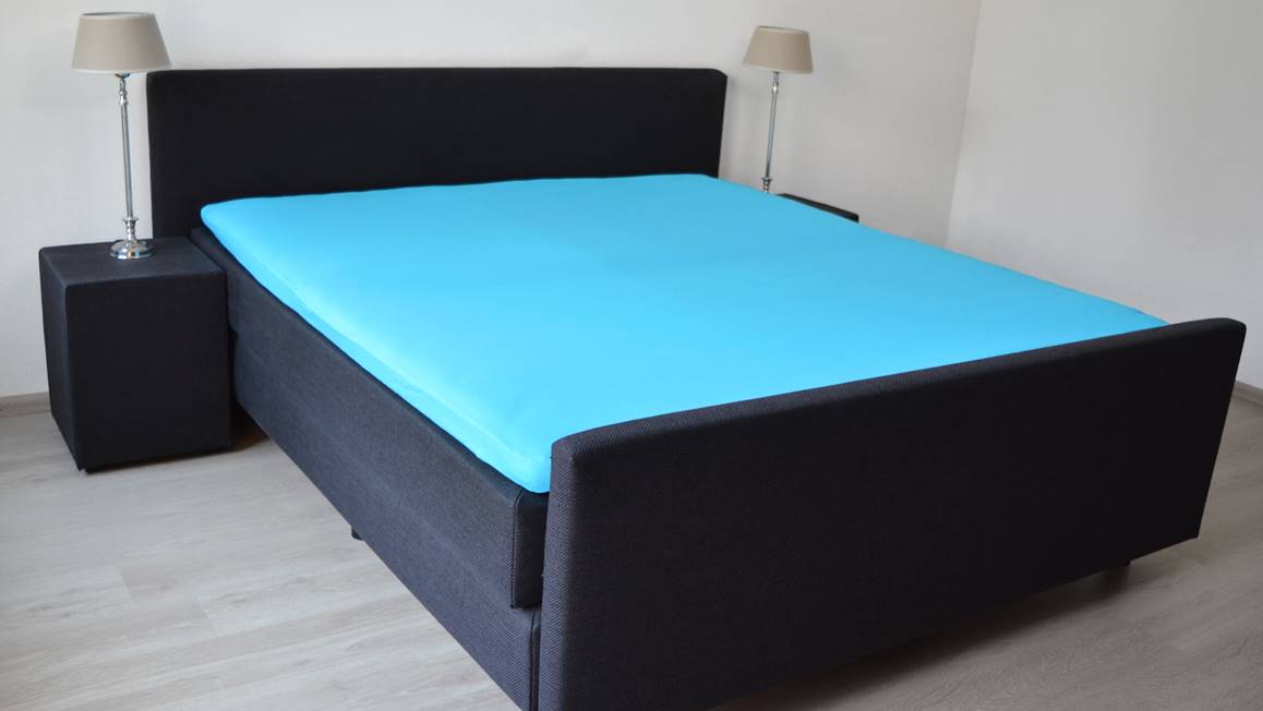 Snoozing percale katoen topper hoeslaken