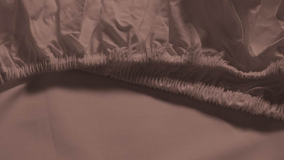 Snoozing percale katoen topper hoeslaken