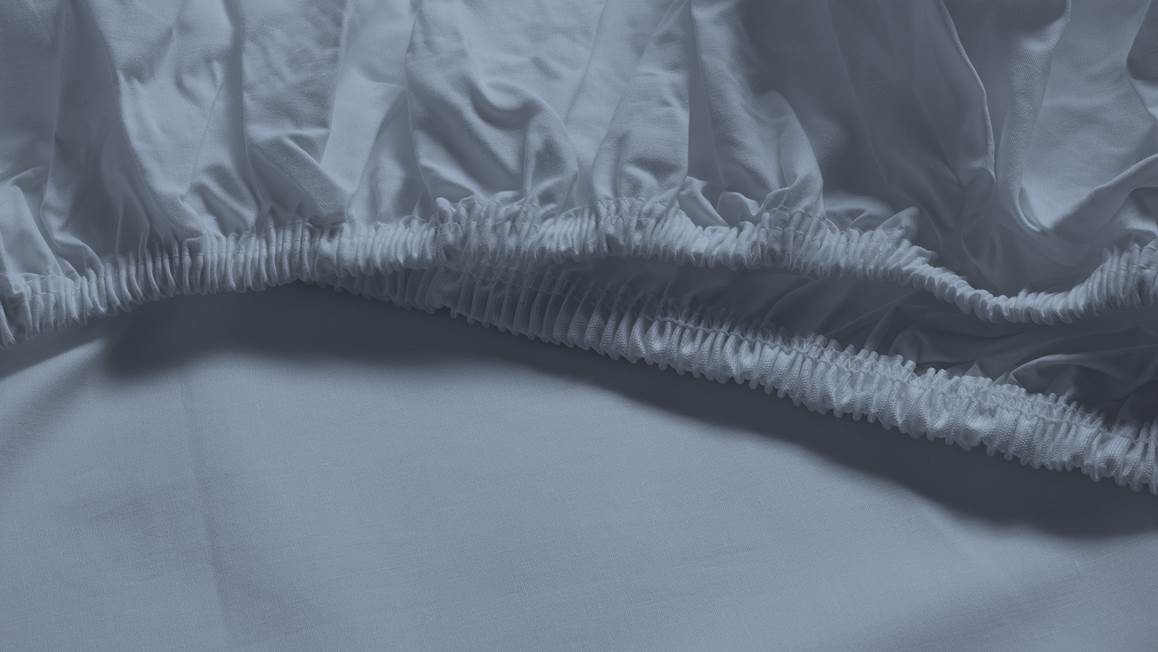 Snoozing percale katoen topper hoeslaken