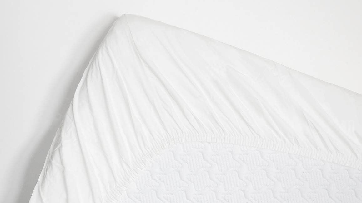 Snoozing percale katoen topper hoeslaken