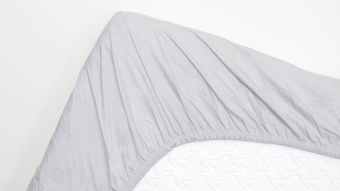 Snoozing percale katoen hoeslaken