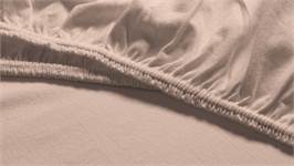 Snoozing jersey stretch topper hoeslaken