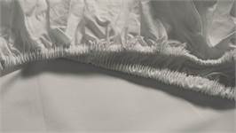 Snoozing percale katoen topper hoeslaken